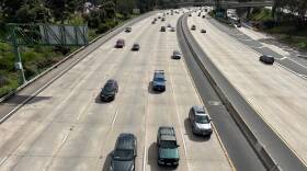 Cars drive through a section of the I-5 freeway that cuts through Balboa Park, Feb. 8, 2024.