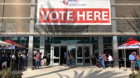 A "Vote Here" sign hangs on the San Diego County Registrar Of Voters Office, Nov. 6, 2018.