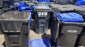 Damaged trash and recycling bins are shown stacked at the Miramar Landfill, Sept. 12, 2019. 
