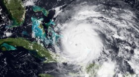 In this handout GOES satellite image provided by the National Oceanic and Atmospheric Administration (NOAA), colorized infrared and visible images show Hurricane Irene's eye forming on August 24, 2011 in the Caribbean Sea.