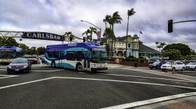 North County Transit Breeze bus going under the Carlsbad sign in this undated photo.